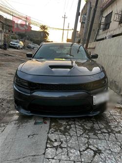 دۆج چارجەر